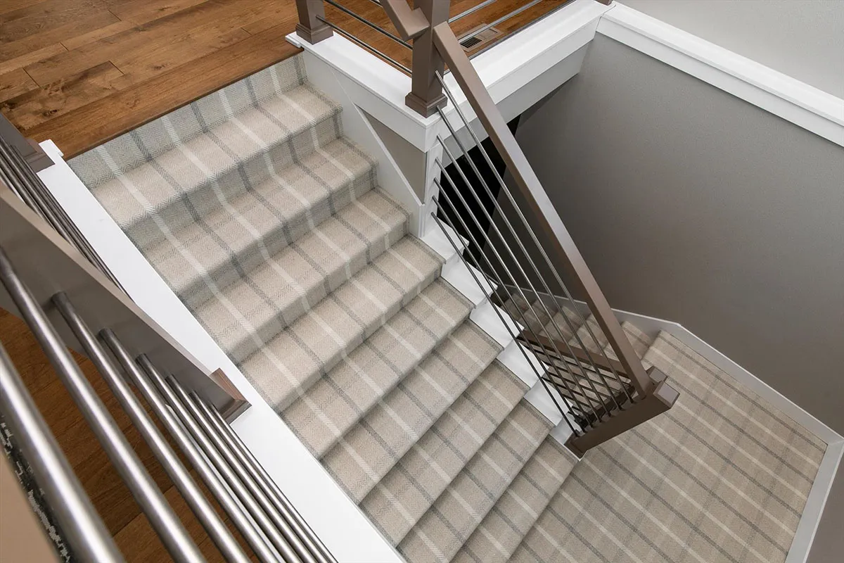 Neutral commercial carpet on stair landing 